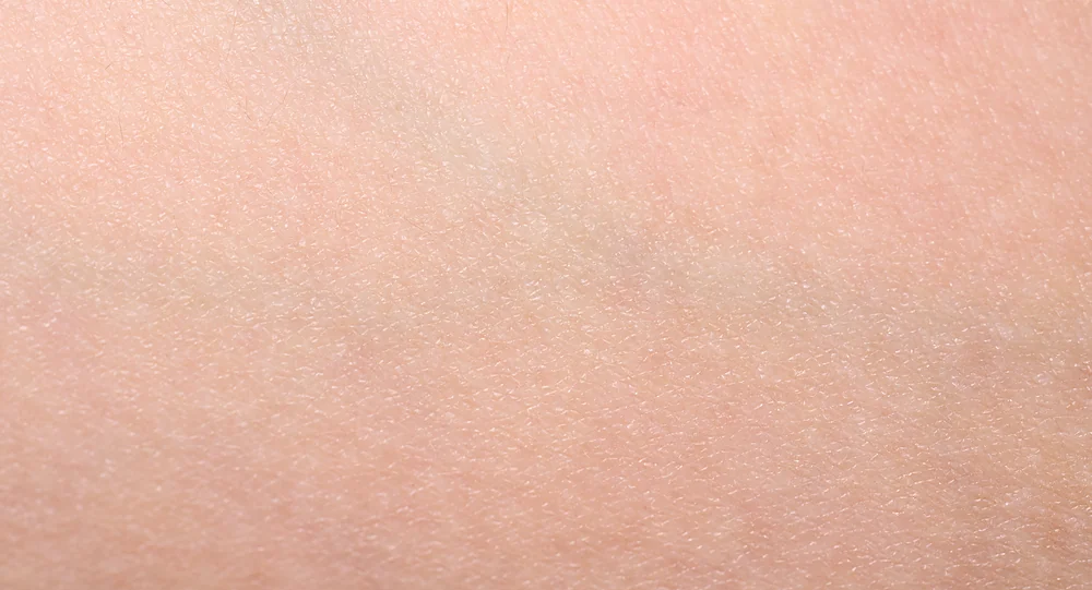 A close-up of clear, even, healthy-looking skin maintained with regular BroadBand Light (BBL), at a Thonotosassa, FL medical spa
