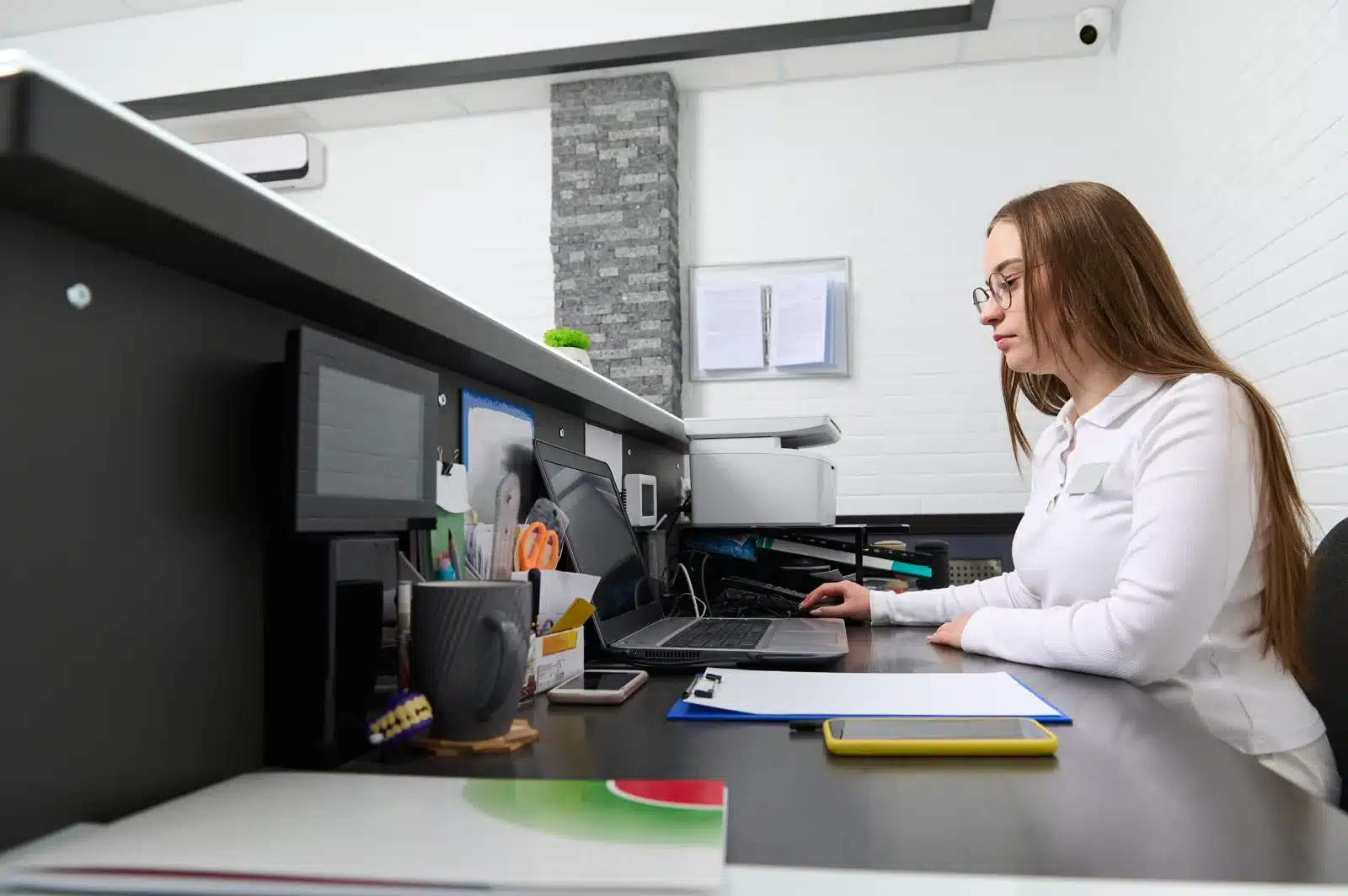 Booking a follow-up dermal filler appointment at the front desk of SpaRx Medical Aesthetics in Thonotosassa, FL