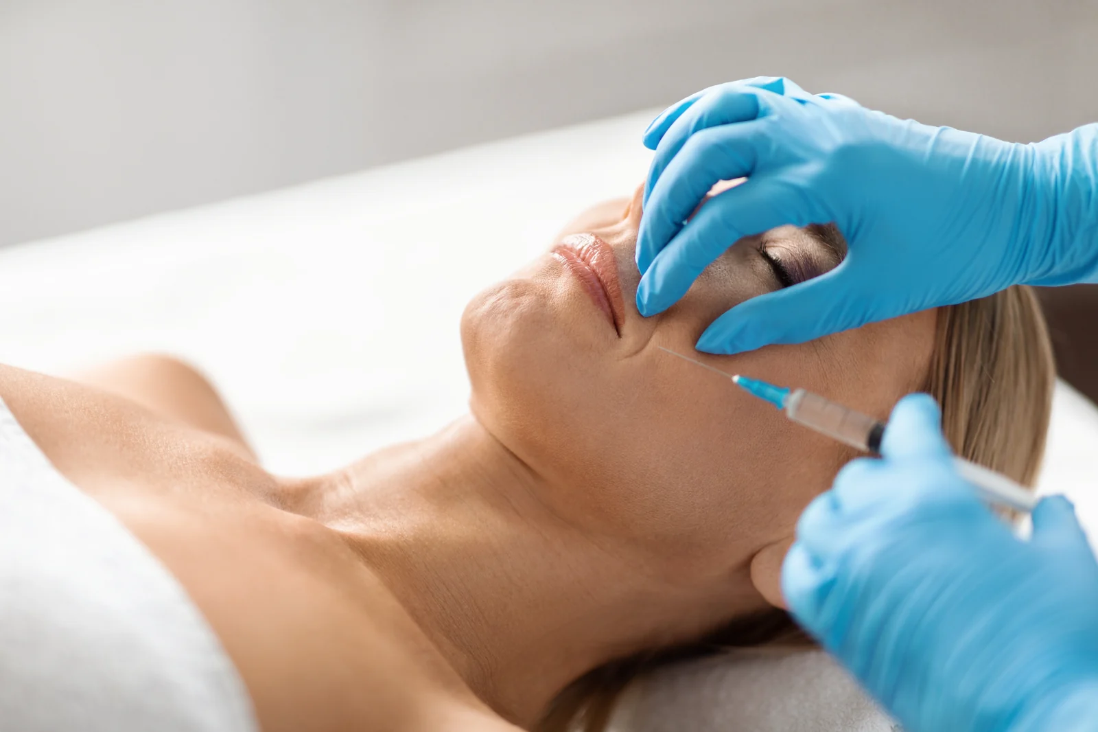 A certified injector placing a hyaluronidase injection to dissolve filler at SpaRx Medical Aesthetics in Thonotosassa, FL