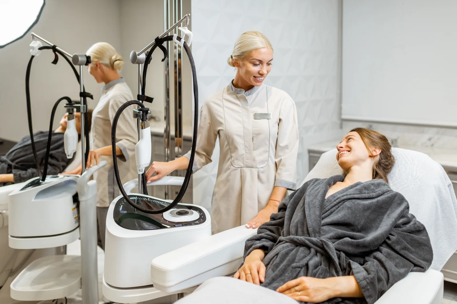 A patient meeting a laser specialist for an IPL photofacial consultation and skin check at SpaRx Medical Aesthetics in Thonotosassa, FL