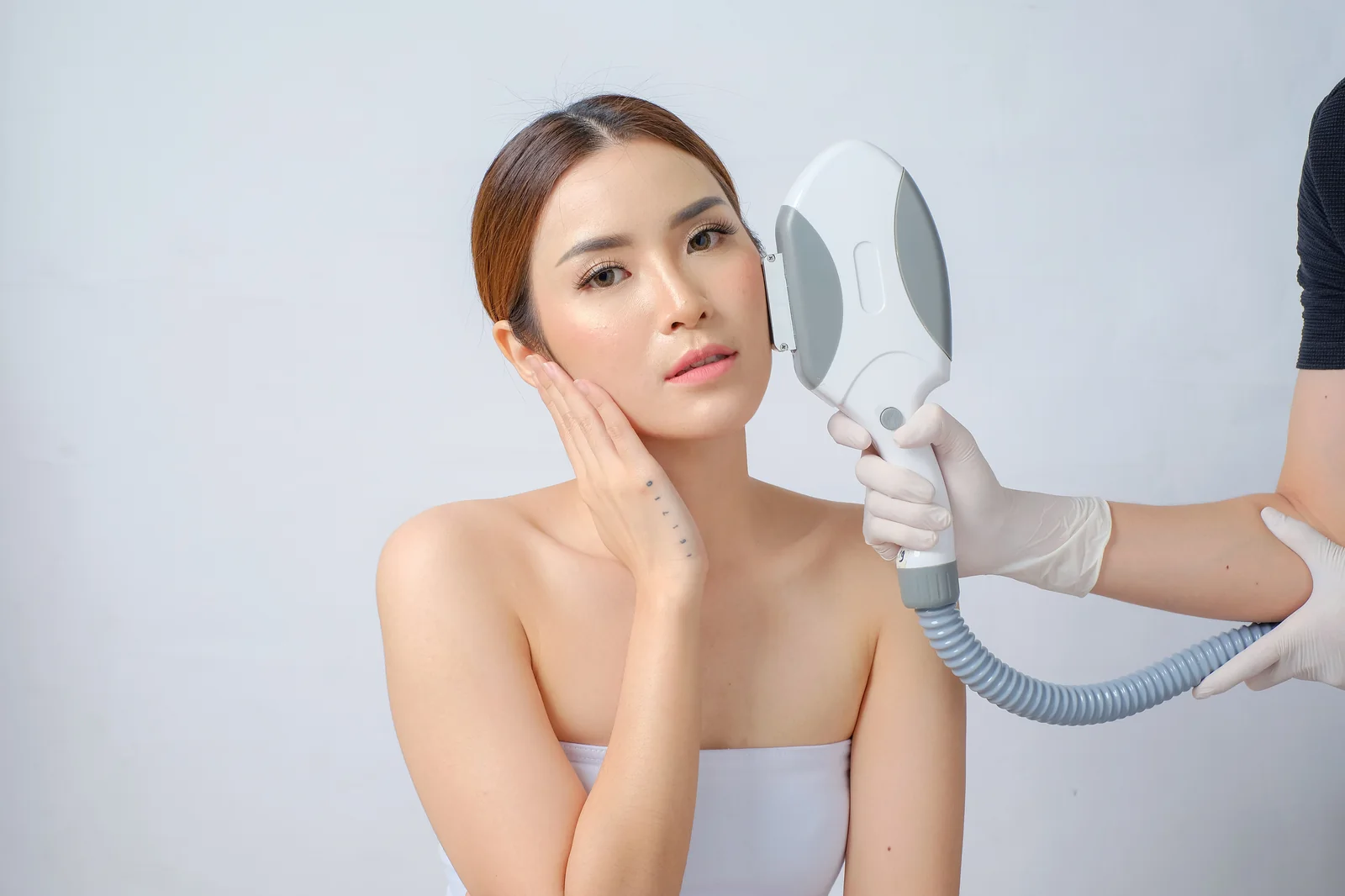 An IPL photofacial treatment in progress with protective eyewear at SpaRx Medical Aesthetics in Thonotosassa, FL