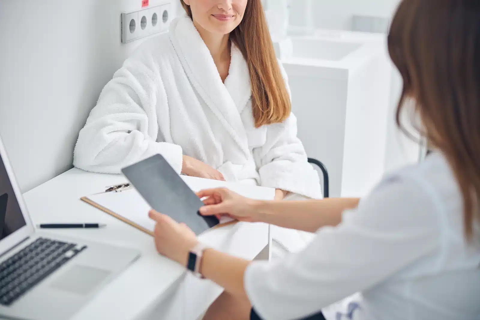 A patient meeting a certified injector for a lip flip consultation at SpaRx Medical Aesthetics in Thonotosassa, FL