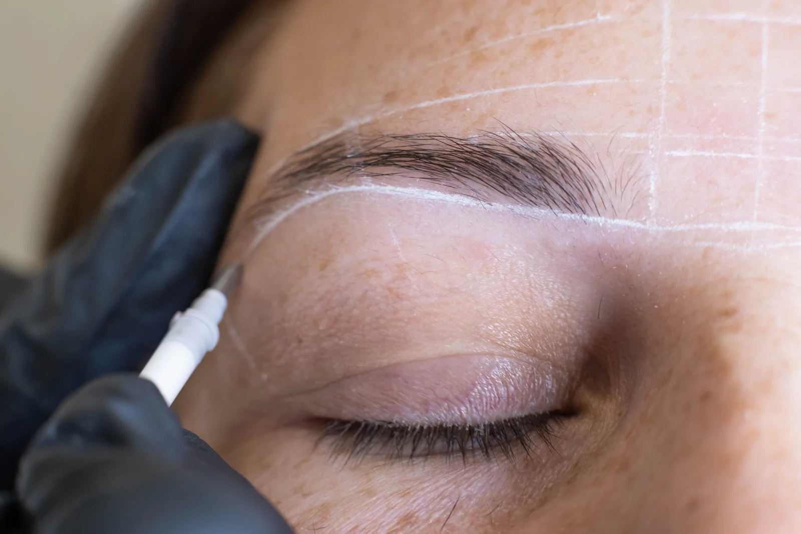 Close-up of fine, hair-like microblading strokes being placed in the brow at SpaRx Medical Aesthetics in Thonotosassa, FL