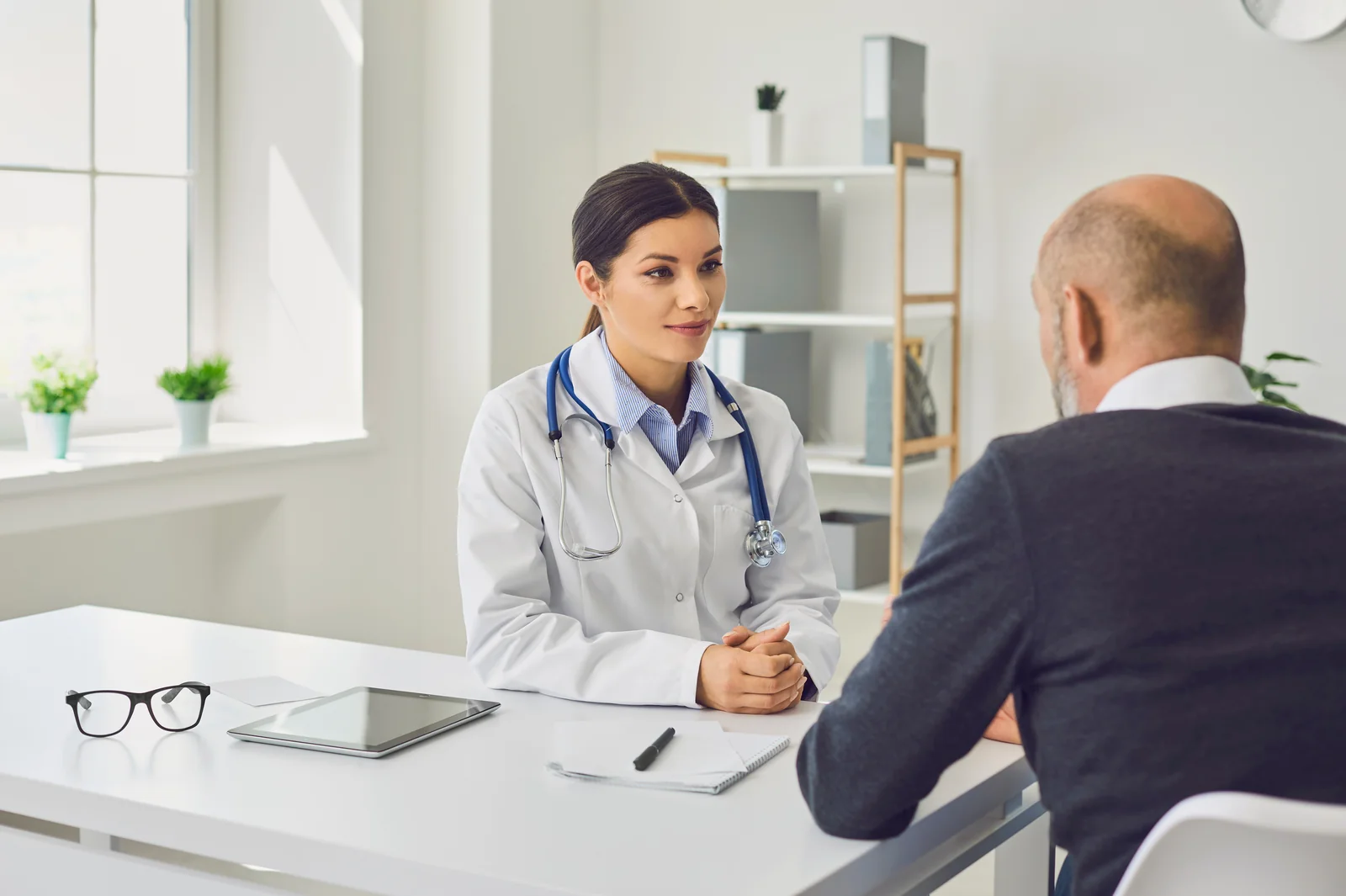A provider explaining what NAD+ injections are and are not to a patient at SpaRx Medical Aesthetics in Thonotosassa, FL.