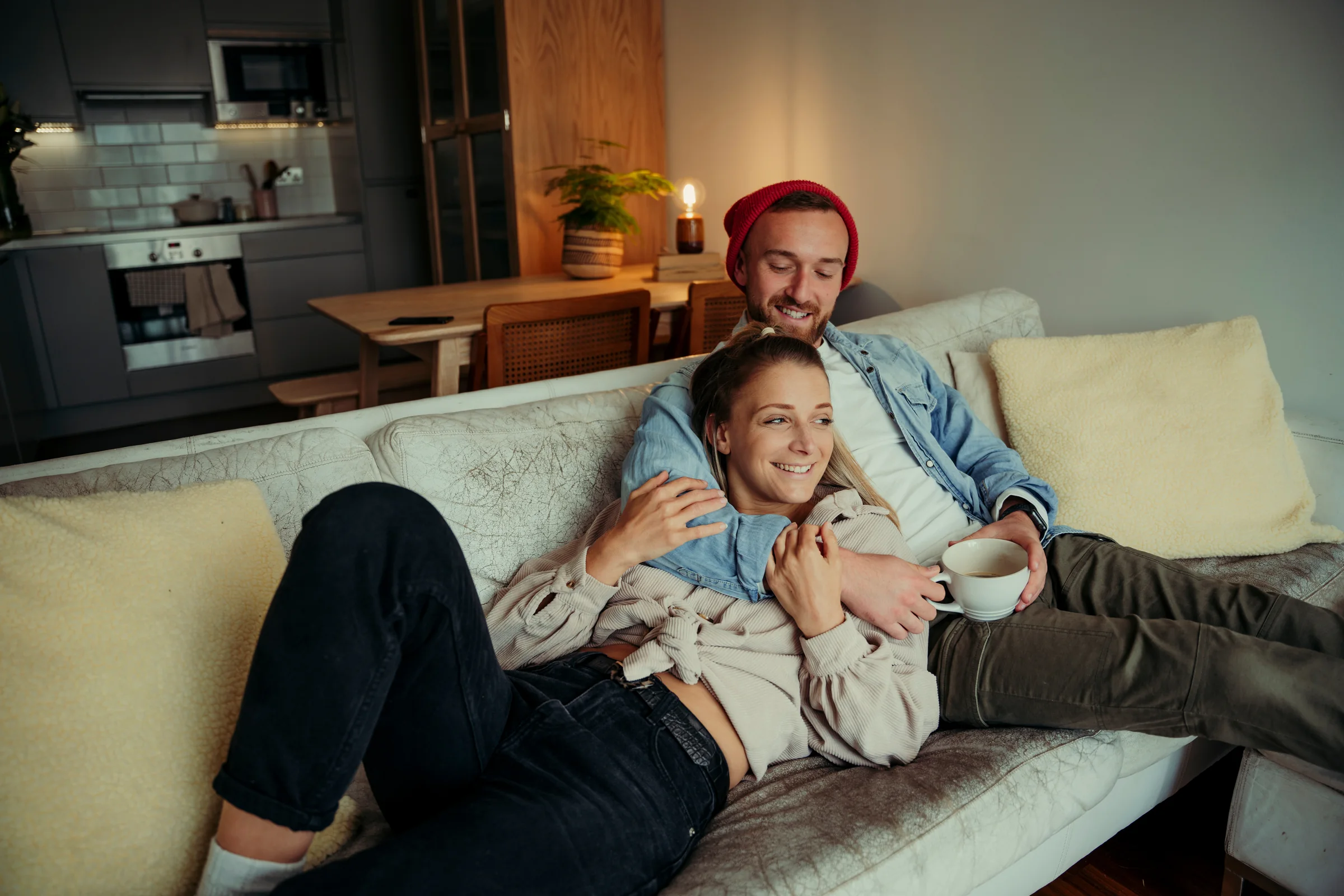 A couple sharing a warm, close moment at home, representing the connection that oxytocin therapy at SpaRx Medical Aesthetics in Thonotosassa, FL is explored to support.