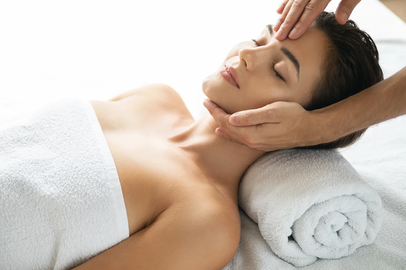 A licensed esthetician cleansing a patient's skin during a SpaRx Signature Facial at SpaRx Medical Aesthetics in Thonotosassa, FL